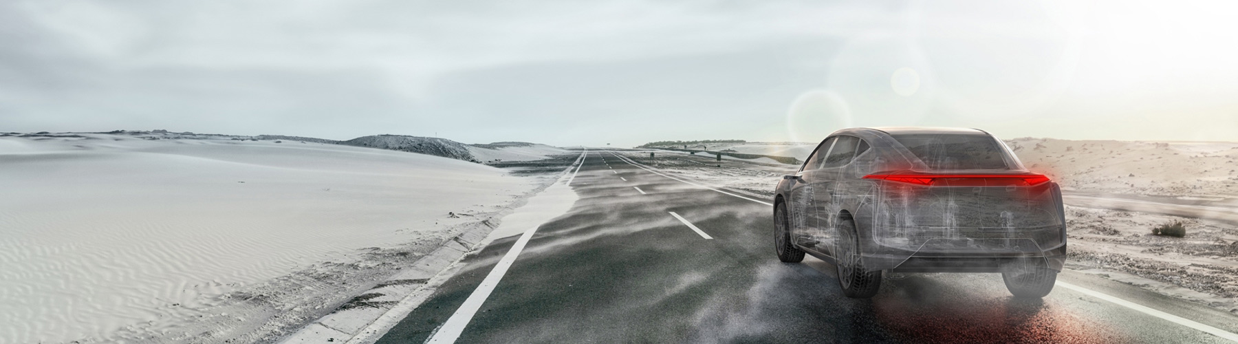 Head lights and tail lights of vehicles travelling along a highway.