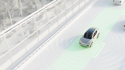 Animated vehicle driving along a highway using lane detection departure warning technology