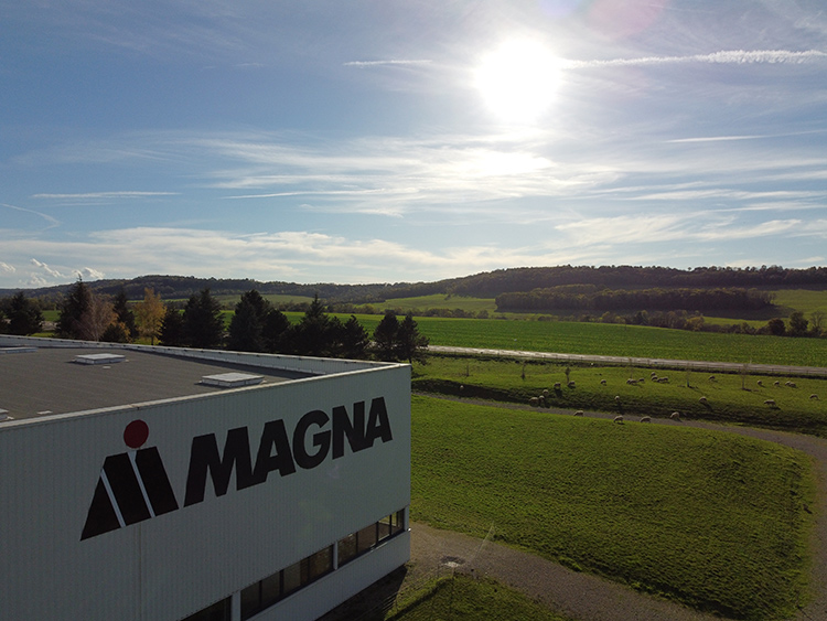 Magna Langres facility in Langres, France with the sun shining