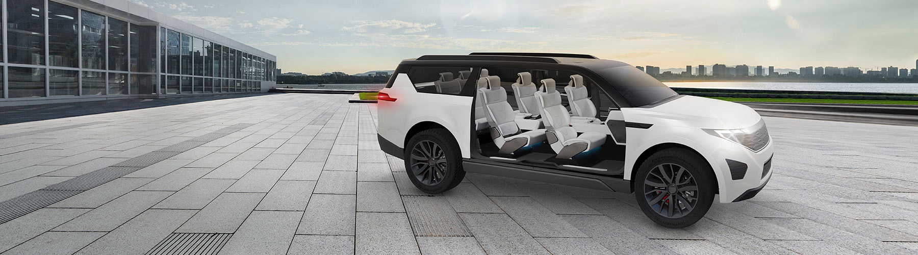 White vehicle with doors opened showing 3 rows of seats with the skyline of a city in the background