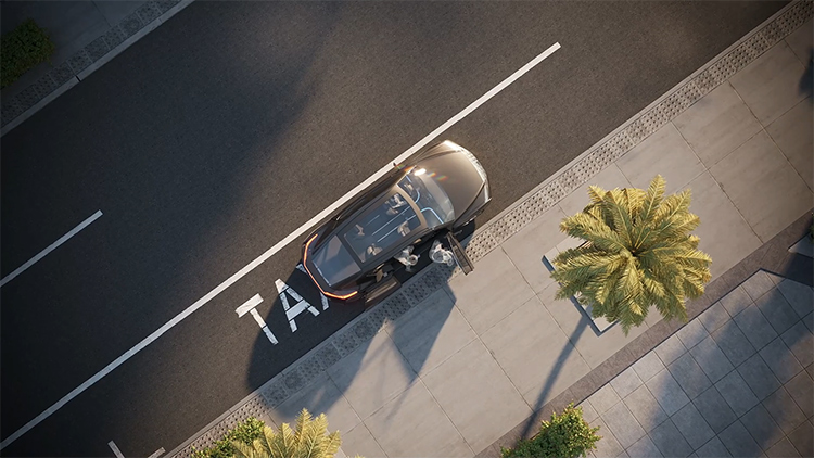 Overhead view of a person getting into a vehicle on the street