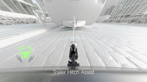 Animated vehicle using trailer hitch assist technology to attach a trailer